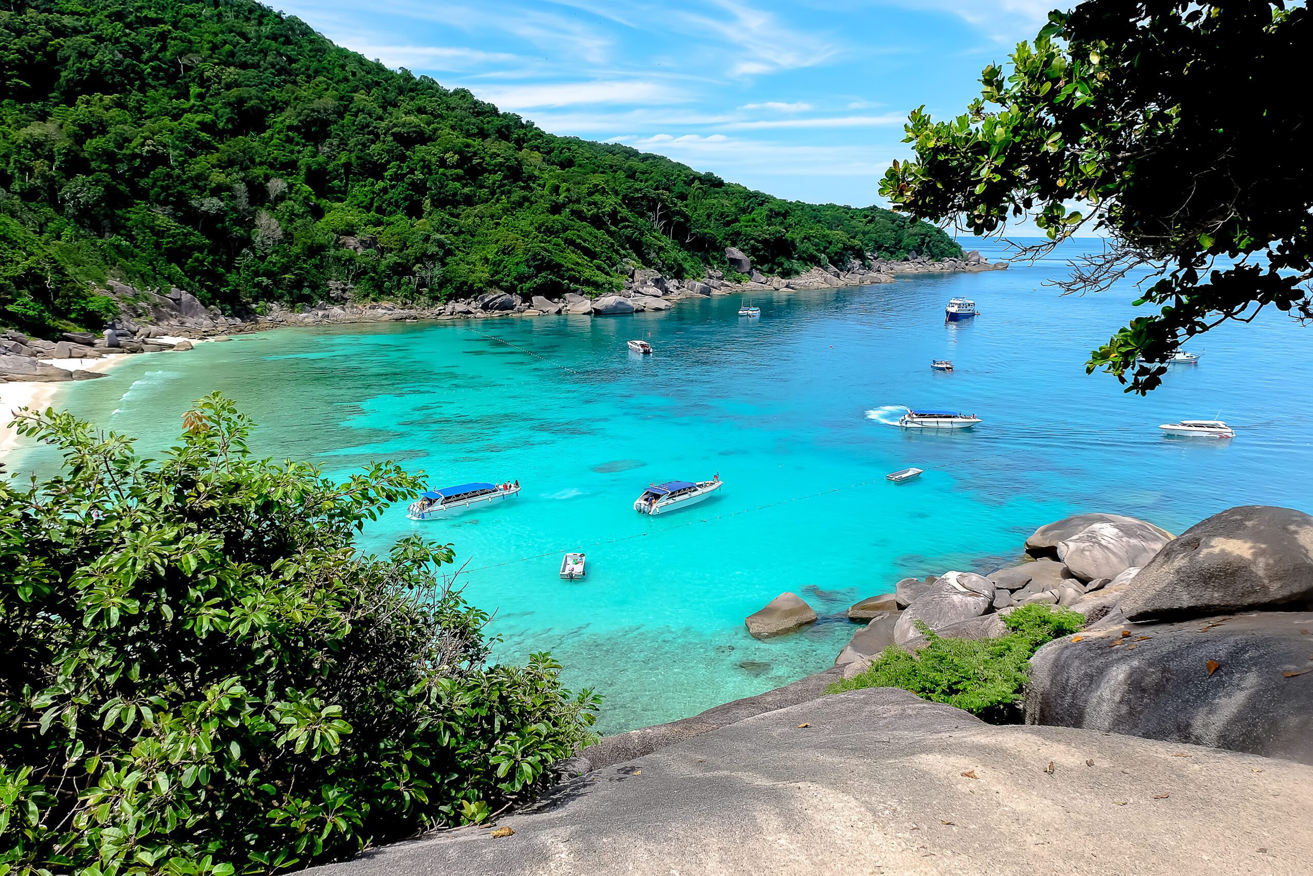 Image is landscape.Mountain View Seeing the sea and tourists are playing the water. In the Similan Islands Thailand.